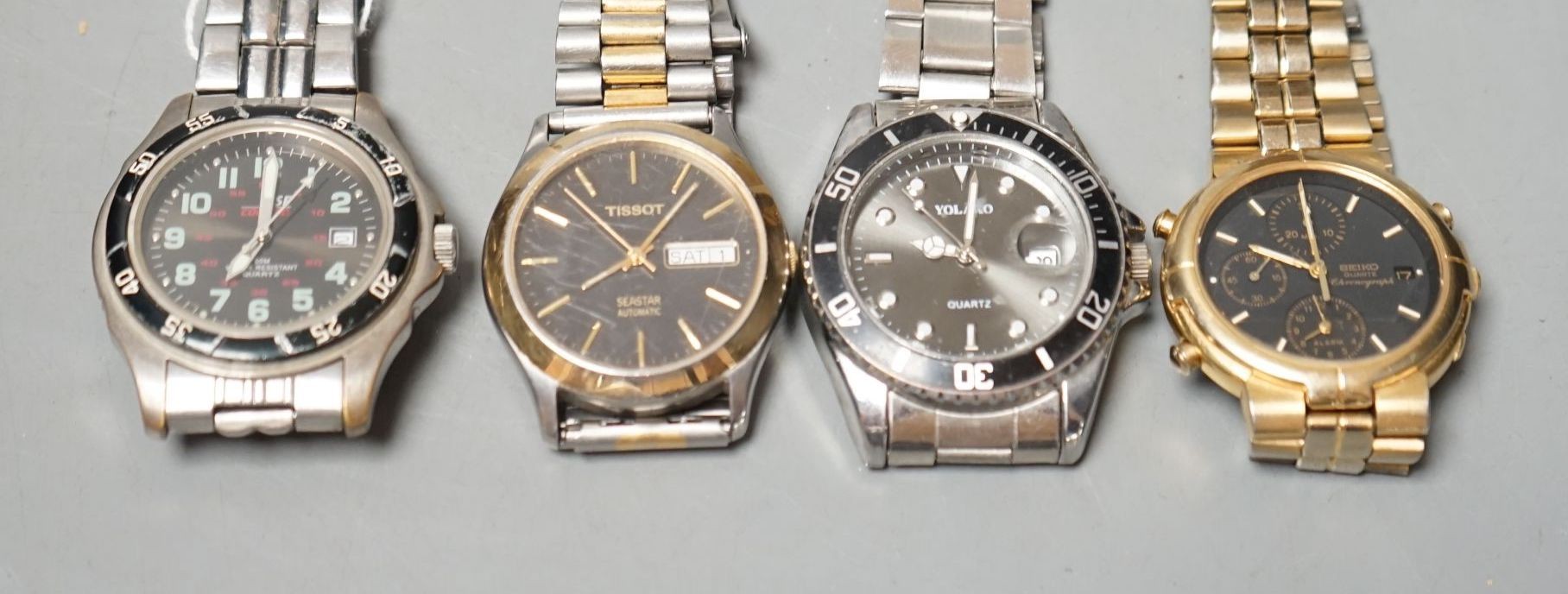 Four assorted gentleman's modern wrist watches, including Seiko and Tissot.